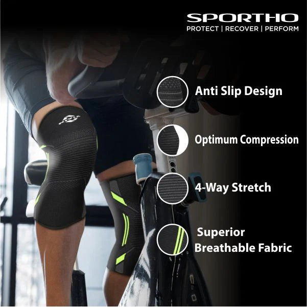 Close-up of an athlete wearing NIVIA Knitted Knee Support Slip-In sleeves while cycling, highlighting anti-slip design, compression fit, four-way stretch material, and breathable fabric construction.