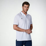 Close-up angled view of a model wearing the NIVIA Ray 17 Polo Shirt in light grey, featuring a classic collar with button placket and contrast trim on the collar and sleeve cuffs, made from polyester cotton fabric for everyday casual wear.