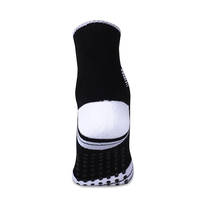 Rear view of a NIVIA Court Sock No Sweat in black with a white heel panel and anti-slip silicone grip dots on the sole, featuring a high ankle design for enhanced support and stability during sports activities.