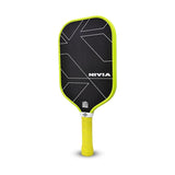 Front view of the NIVIA K-3000 Pro Pickleball Paddle featuring a black carbon surface with geometric line detailing and NIVIA branding, a neon yellow edge guard, and a cushioned yellow handle grip, designed for controlled outdoor pickleball play.