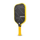 Back view of the NIVIA K-5000 Pro Pickleball Paddle featuring a black carbon-textured surface with white geometric line accents, NIVIA branding, a yellow edge guard, and a yellow perforated grip with a black neck band.