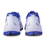 Rear view of NIVIA Crick 1000 Cricket Shoes in white and blue showing the heel structure, moulded heel counter, and blue rubber outsole designed for grip and stability during cricket play.