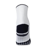 Rear view of a white NIVIA Court Sock with navy heel panel and trim, featuring anti-slip silicone grip dots on the sole and a high ankle design for added support and stability during sports activities.