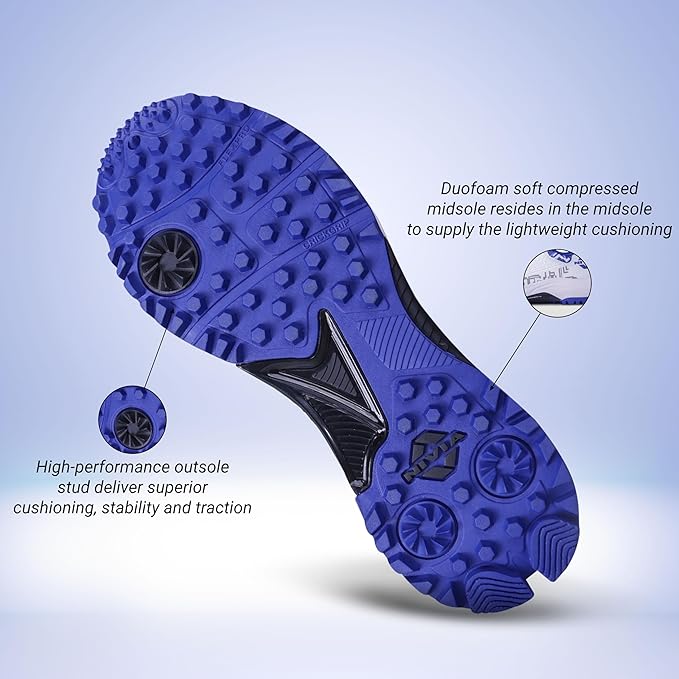 Rear view of NIVIA Crick 1000 Cricket Shoes in white and blue showing the heel structure, moulded heel counter, and blue rubber outsole designed for grip and stability during cricket play.