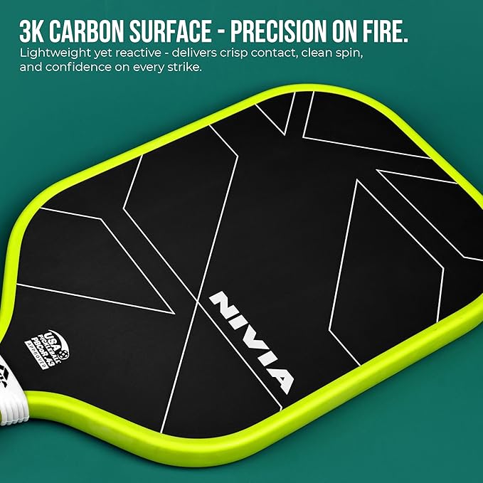 Close-up of the NIVIA K-3000 Pro Pickleball Paddle highlighting its 3K carbon surface with geometric line detailing and neon yellow edge guard. Overlay text reads: “3K CARBON SURFACE – PRECISION ON FIRE. Lightweight yet reactive – delivers crisp contact, clean spin, and confidence on every strike.