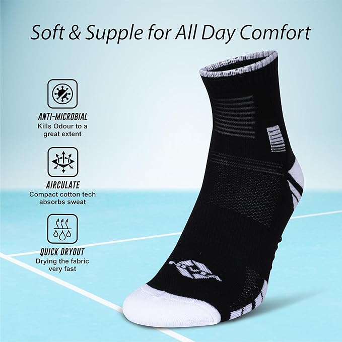 NIVIA Court Socks No Sweat in black with white toe and logo, shown with text highlighting “Soft & Supple for All Day Comfort.” Feature icons indicate anti-microbial odor control, sweat absorption with air circulation, and quick-dry fabric technology for enhanced comfort during sports activities.