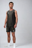 Full-length front view of a model wearing the NIVIA Skylite Track and Field Athletic Kit in black, featuring a sleeveless jersey and matching shorts, designed for track and field training and sports activities.