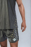 Close-up view of the NIVIA Skylite Track and Field Athletic Kit in black, highlighting the sleeveless jersey and matching shorts with yellow accent detailing, designed for track and field training and sports activities.
