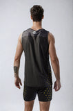 Back view of a model wearing the NIVIA Skylite Track and Field Athletic Kit in black, featuring a sleeveless jersey and matching shorts with yellow accent detailing, suitable for track and field training and sports activities.