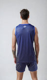 Back view of a model wearing the NIVIA Skylite Track and Field Athletic Kit in blue, featuring a sleeveless jersey and matching shorts with yellow accent detailing, suitable for track and field training and sports activities.