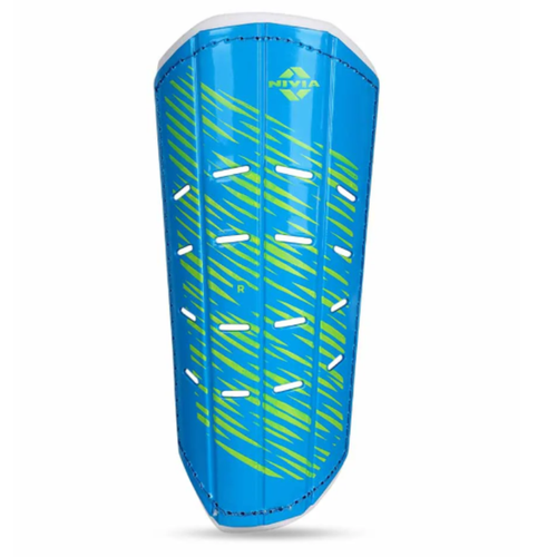 Front view of the NIVIA Performance Shin Guard in blue with neon green graphic accents and ventilation slots, featuring a hard protective shell designed to provide impact protection and comfortable movement for soccer players of all skill levels.