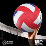 NIVIA VAYU Volleyball held above an indoor volleyball net, featuring a red, white, and blue 12-panel design with textured microfiber PU surface, suitable for indoor match play following FIVB standards.
