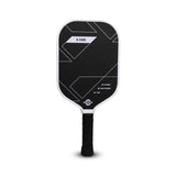 Nivia K-2500 Pickleball Paddle with carbon surface and 16 mm core, black face design with white edge guard and black handle grip, suitable for outdoor play.