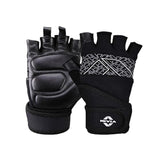 Pair of NIVIA Pro Grip Gym Gloves in black featuring a half-finger design, padded palm for enhanced grip, and adjustable wrist support strap, designed for weightlifting and fitness workouts.