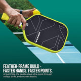 Player holding the NIVIA K-3000 Pro Pickleball Paddle with a black carbon face and neon yellow edge guard and grip on an outdoor court, with a yellow pickleball visible behind the paddle. Overlay text reads: “FEATHER-FRAME BUILD – FASTER HANDS. FASTER POINTS. At just 230g, the paddle stays ultra-quick through volleys, dinks, and counter attacks.